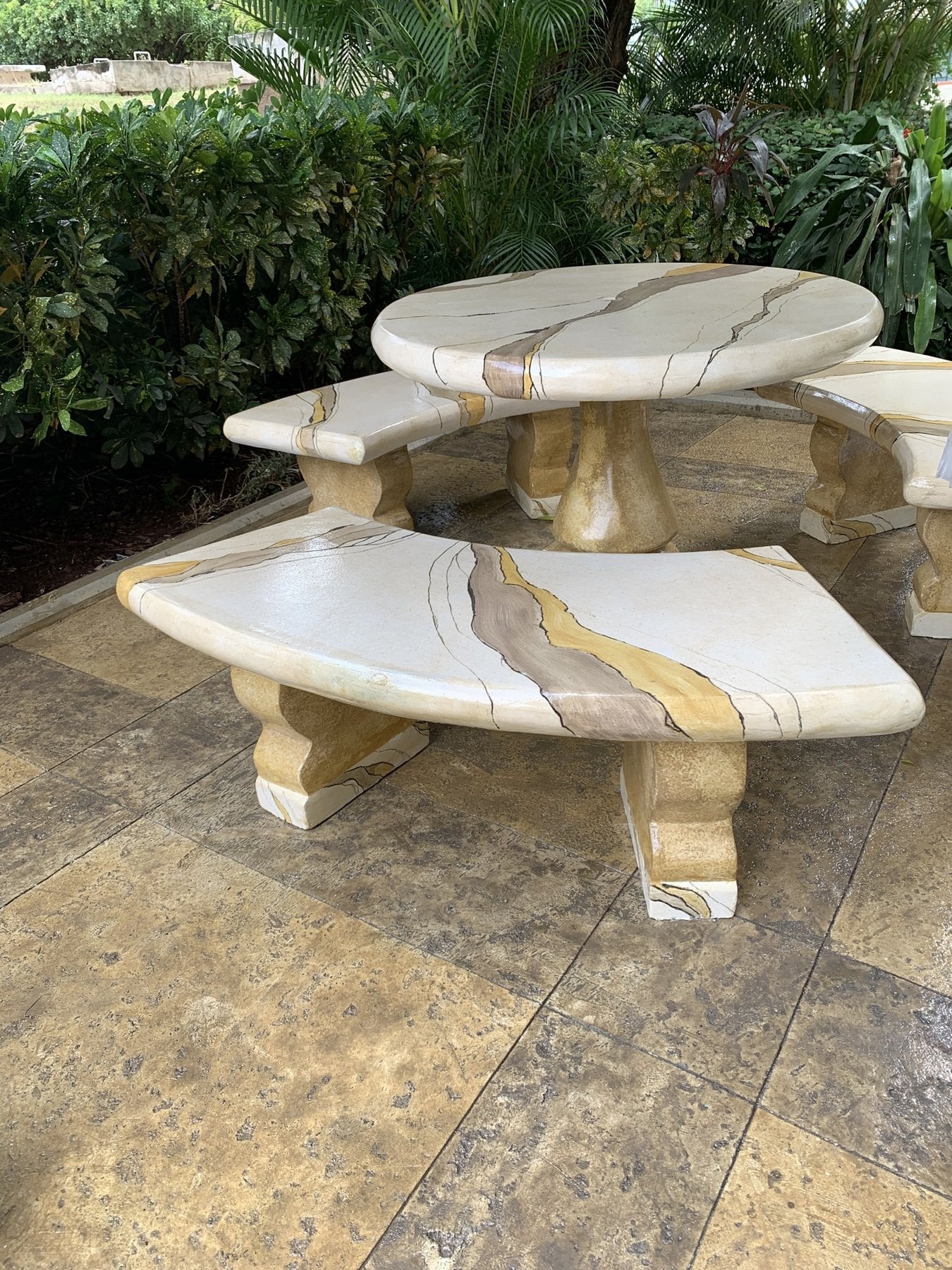 The completed marble-finished table and curved benches, installed in the PIOJ garden.