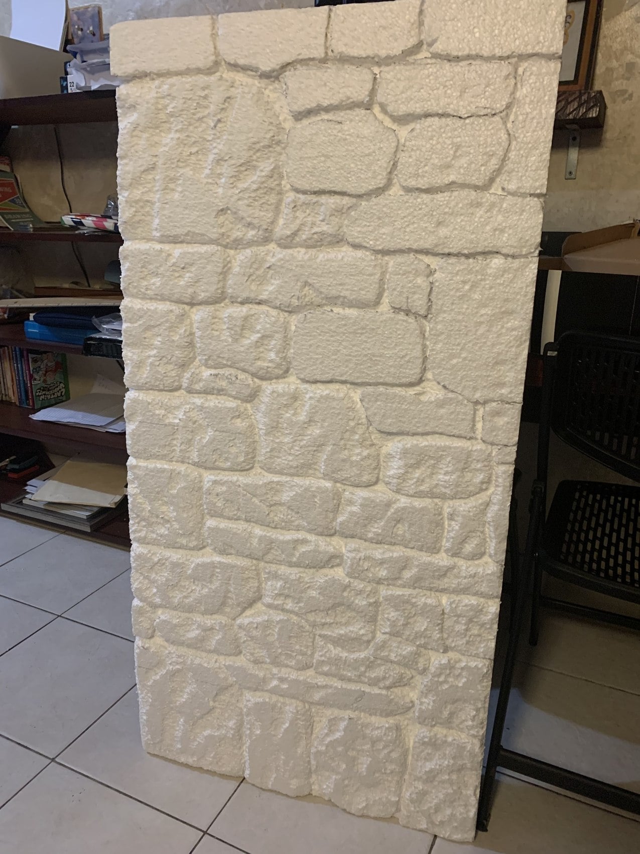 White relief prototype with stone-like shapes in several sizes